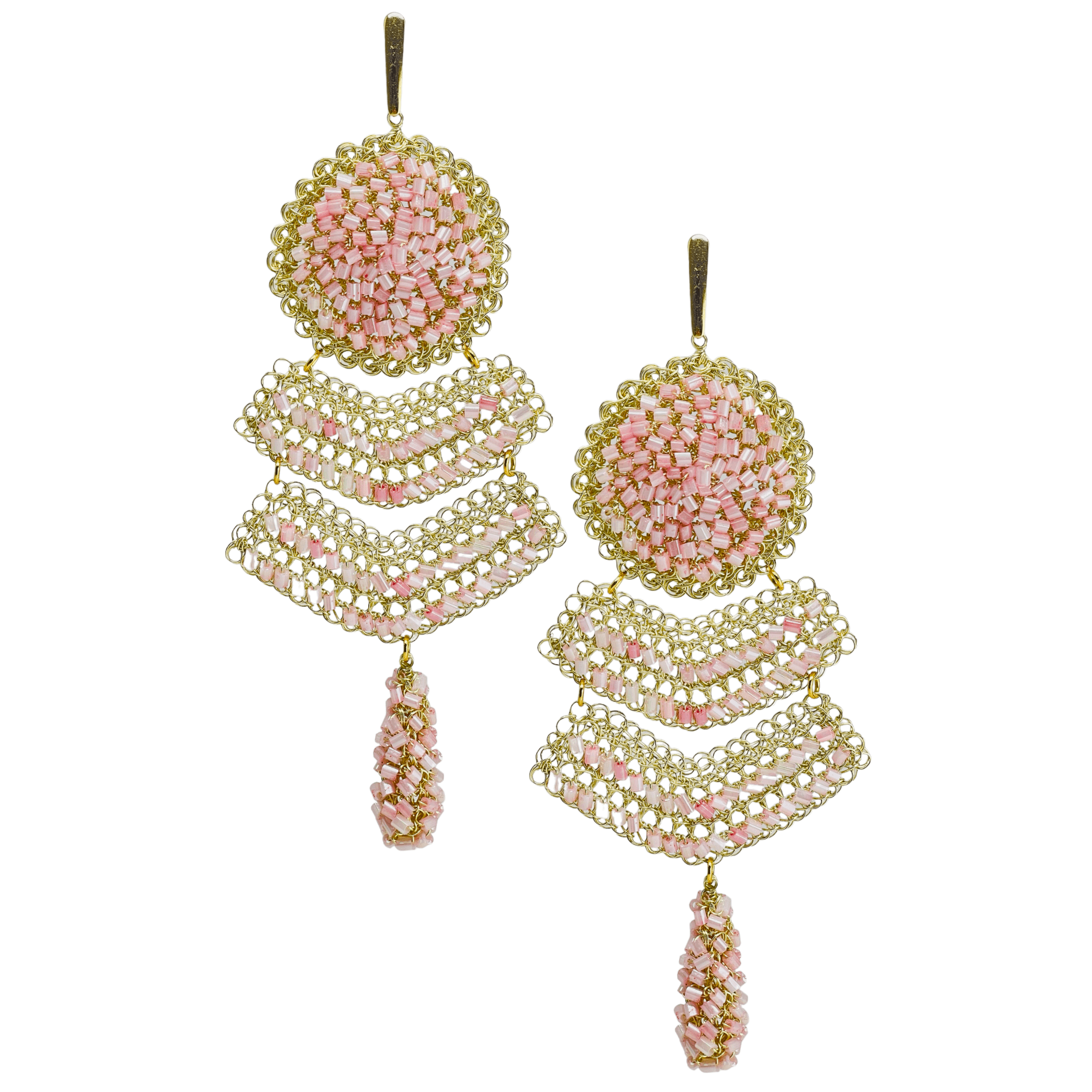 woman handmade earrings in golden wire woman handmade earrings in golden wire