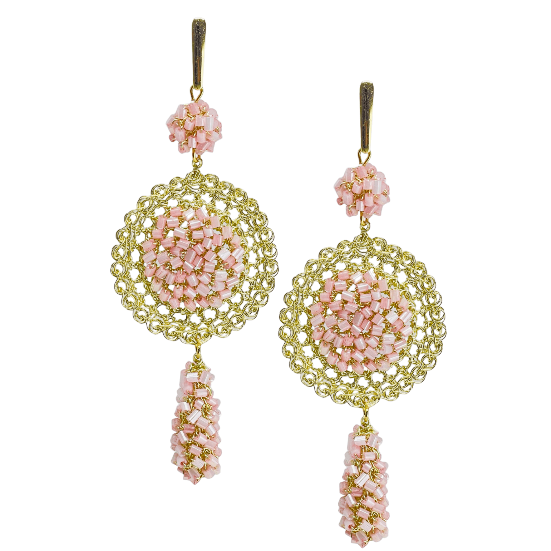 woman handmade earrings in golden wire