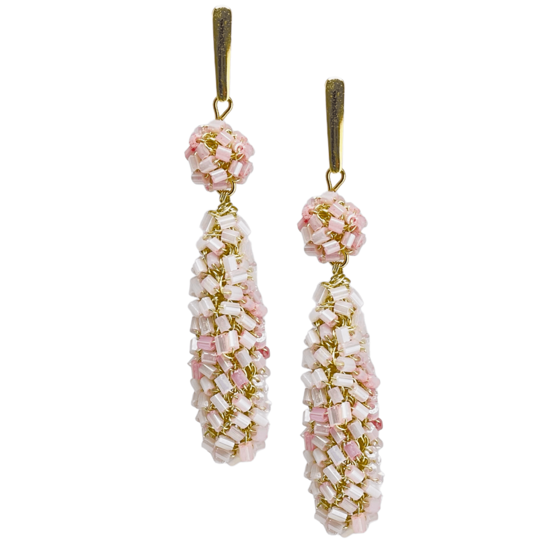 woman handmade earrings in golden wire