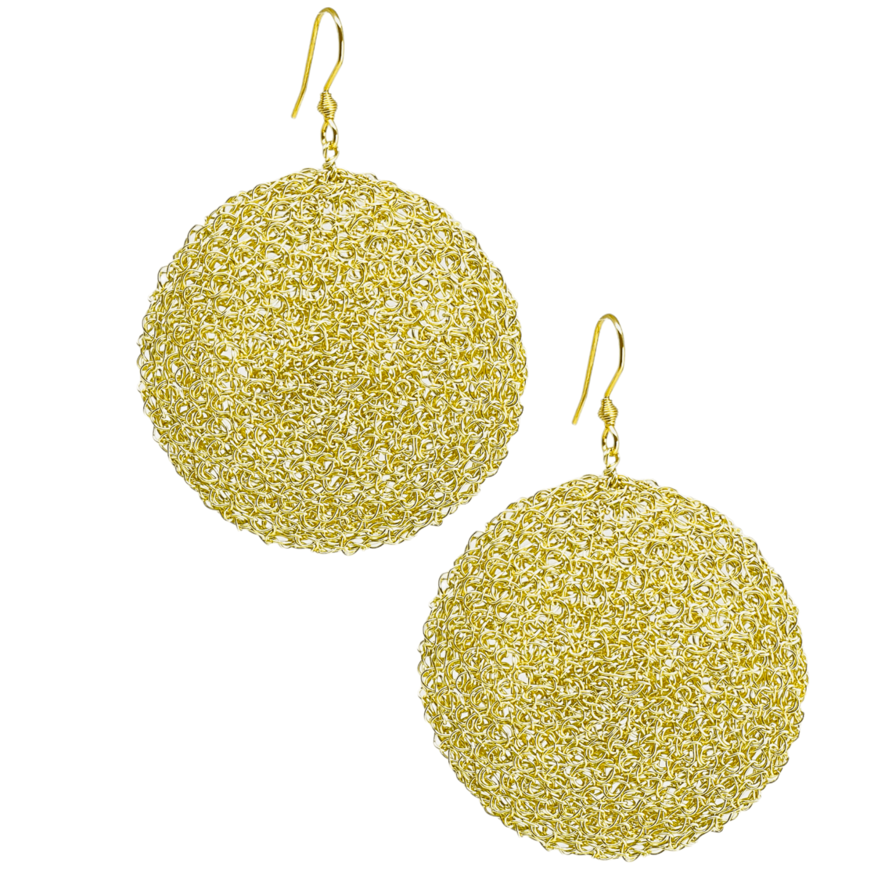 woman handmade earrings in golden wire