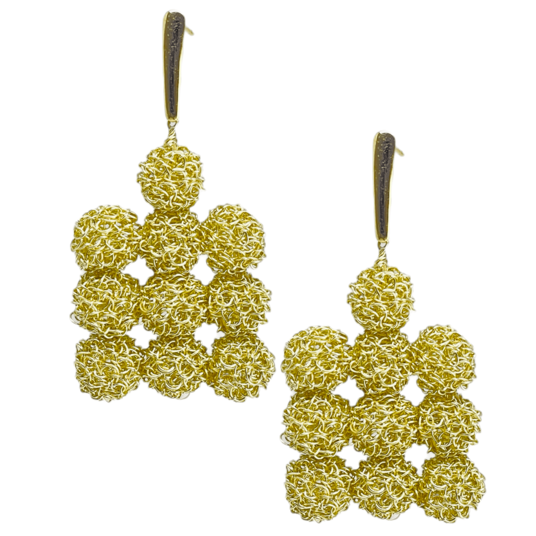 woman handmade earrings in golden wire