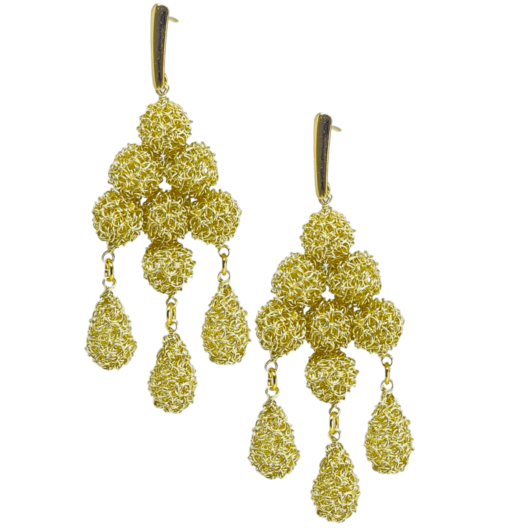 woman handmade earrings in golden wire