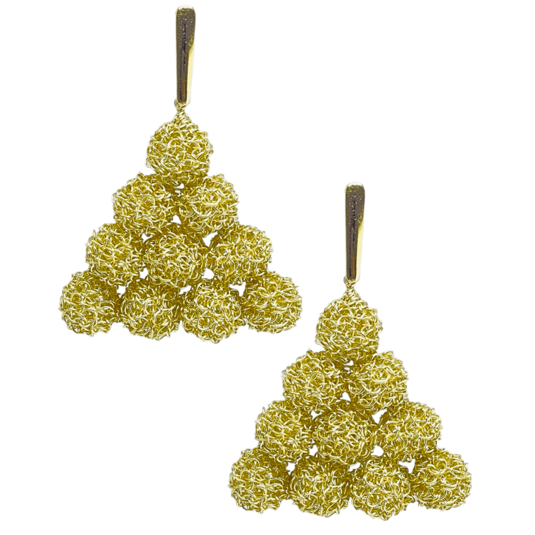 woman handmade earrings in golden wire