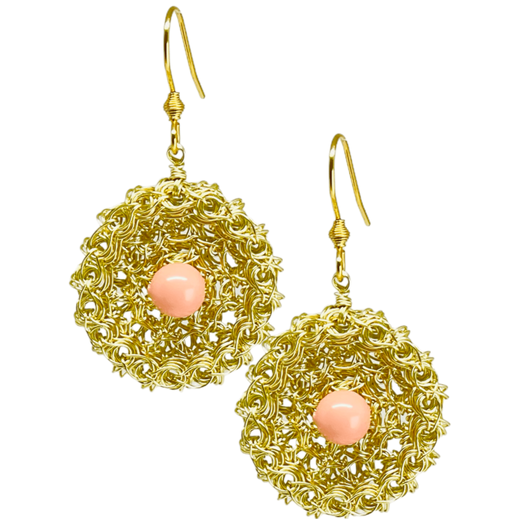 woman handmade earrings in golden wire