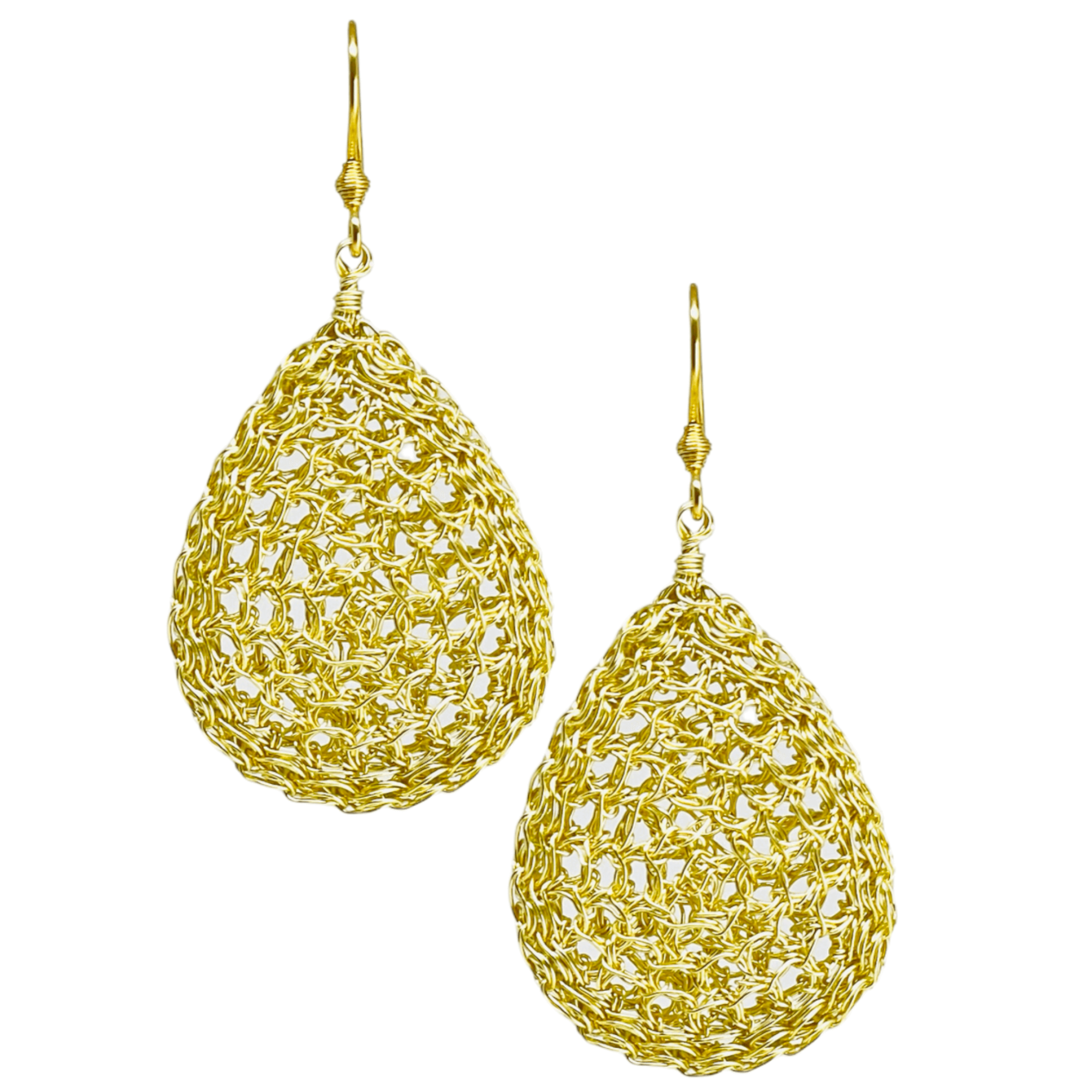 woman handmade earrings in golden wire