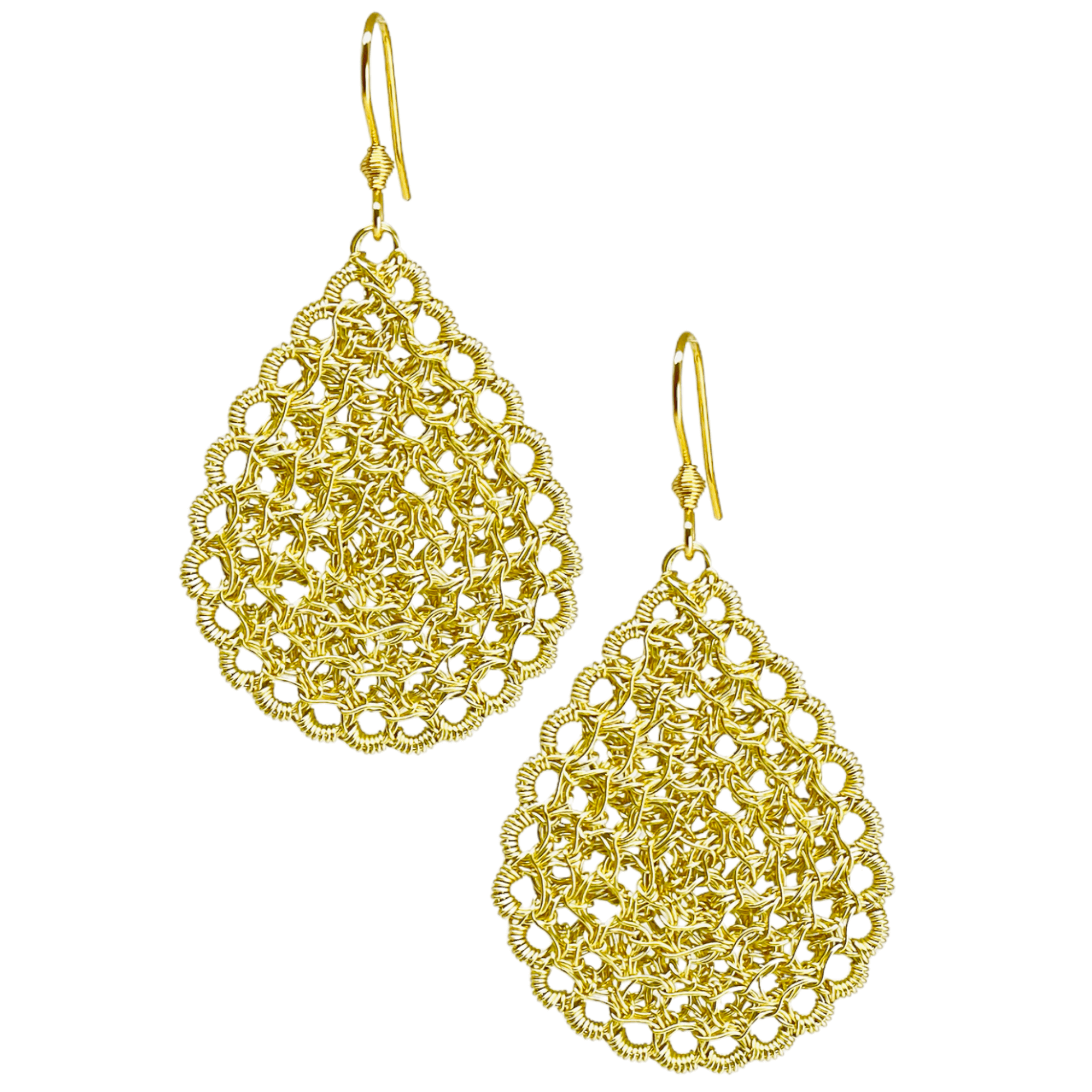 woman handmade earrings in golden wire woman handmade earrings in golden wire