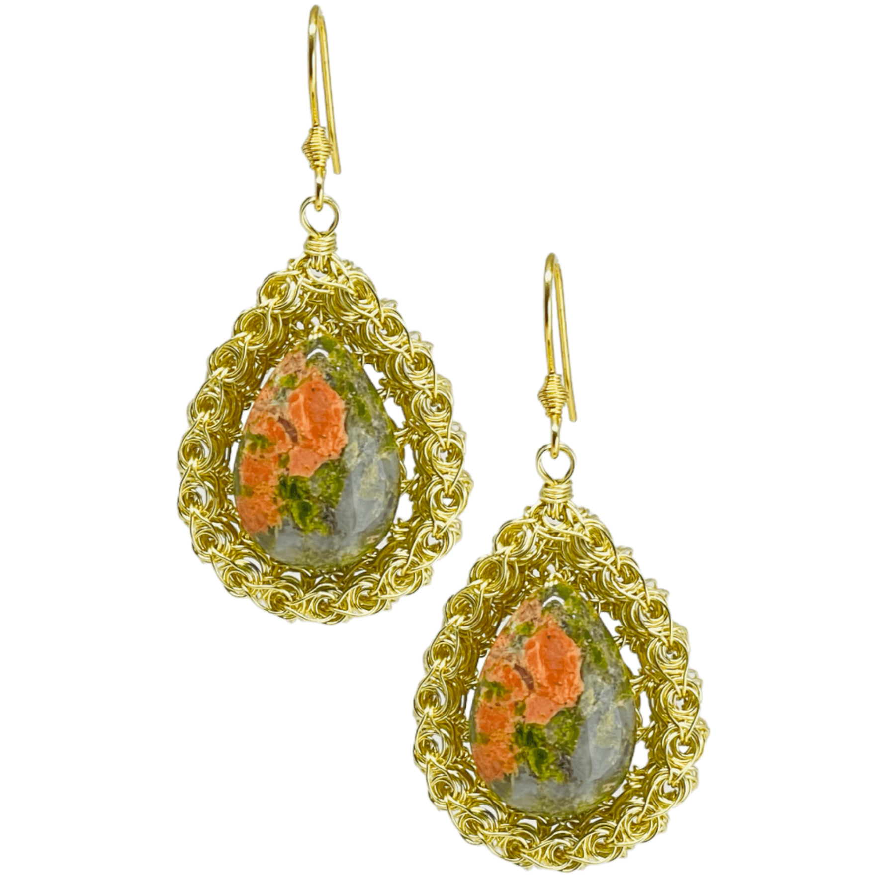 woman handmade earrings in golden wire