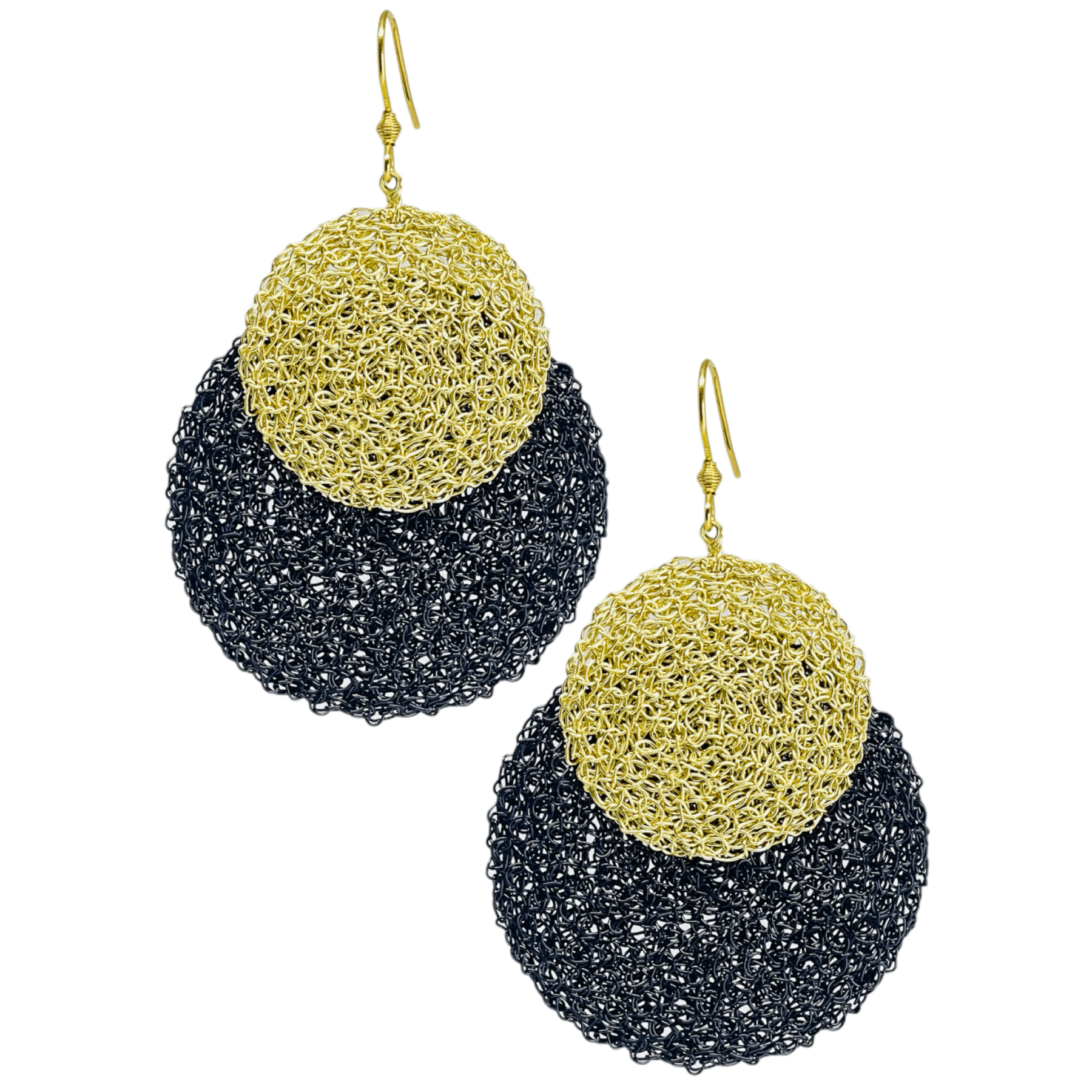 woman handmade earrings in golden wire