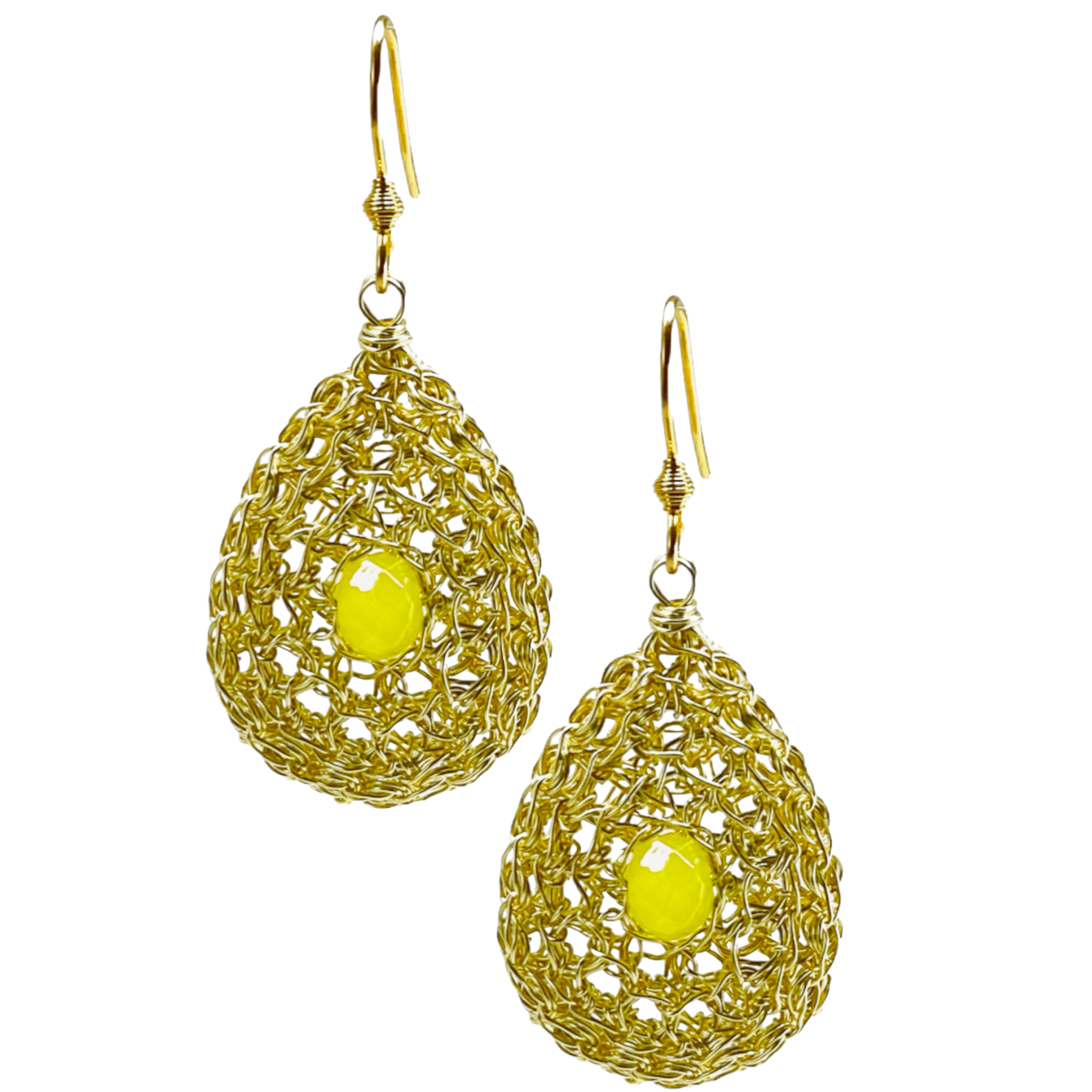 woman handmade earrings in golden wire